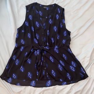 Torrid 1. Sleeveless button down.